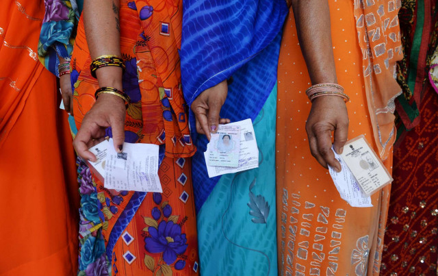 in this file photo women stand in line to cast their vote during the 2014 general elections in india photo afp