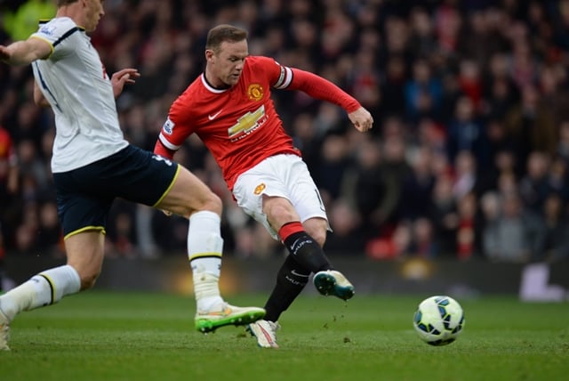 van gaal praised rooney for helping to inspire his side to a crucial 3 0 win over premier league top four rivals tottenham photo afp