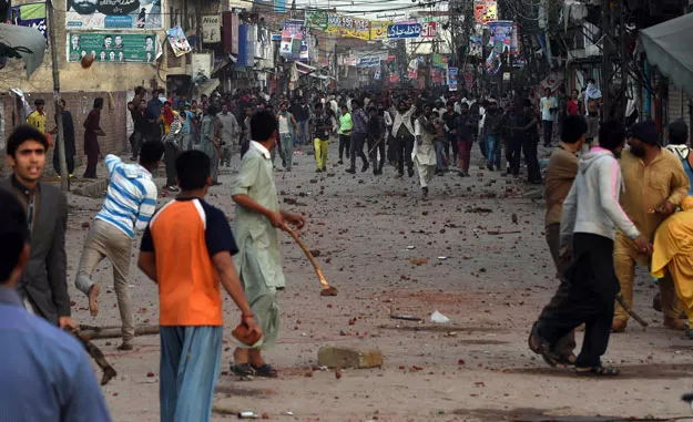 demonstrators clash during a protest in lahore on march 16 2015 photo afp demonstrators clash during a protest in lahore on march 16 2015 photo afp