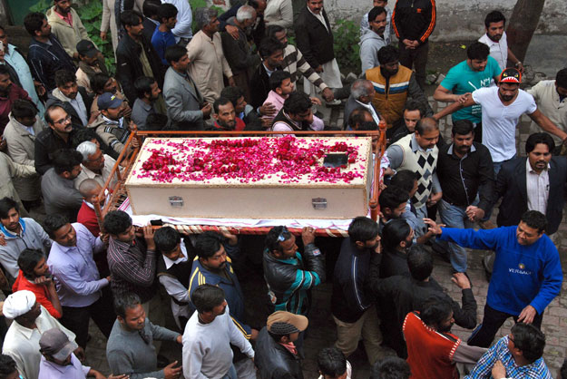 bishop irfan jameel offered the funeral prayers the body was taken to youhanabad s main graveyard for burial photo shahbaz malik express