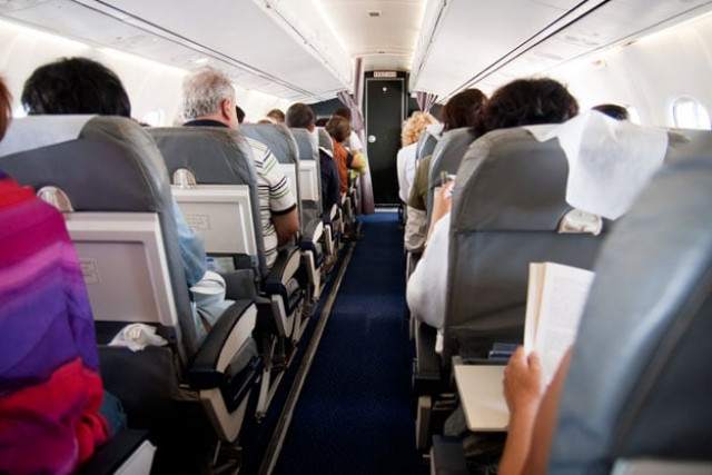 cabin crew were unable to fix the problem and had to turn around as the smell became unbearable for passengers stock image cabin crew were unable to fix the problem and had to turn around as the smell became unbearable for passengers stock image