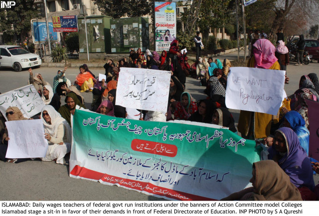 ehsan bangash a teacher from imcb f 8 4 said daily wage staffers have been serving in model colleges from many years yet they are still deprived of their due right of regularisation of services as well as timely payment of salaries photo inp