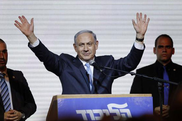 israeli prime minister benjamin netanyahu waves to supporters at the party headquarters in tel aviv march 18 2015 photo reuters