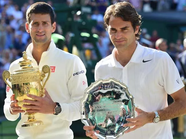 novak djokovic left shows off the winner 039 s trophy after defeating roger federer in the men 039 s final at wimbledon 2014 photo afp novak djokovic left shows off the winner 039 s trophy after defeating roger federer in the men 039 s final at wimbledon 2014 photo afp