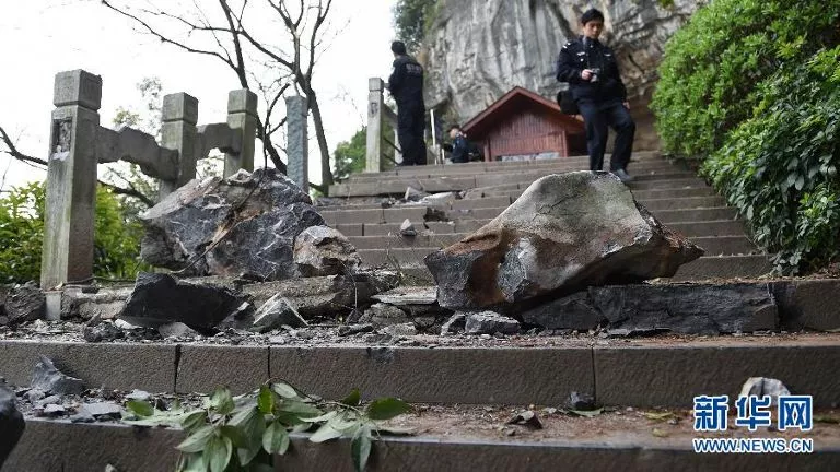 the rocks hit group of travellers as they waited to board boats in the diecai mountain scenic area in guili photo courtesy channel news asia the rocks hit group of travellers as they waited to board boats in the diecai mountain scenic area in guili photo courtesy channel news asia