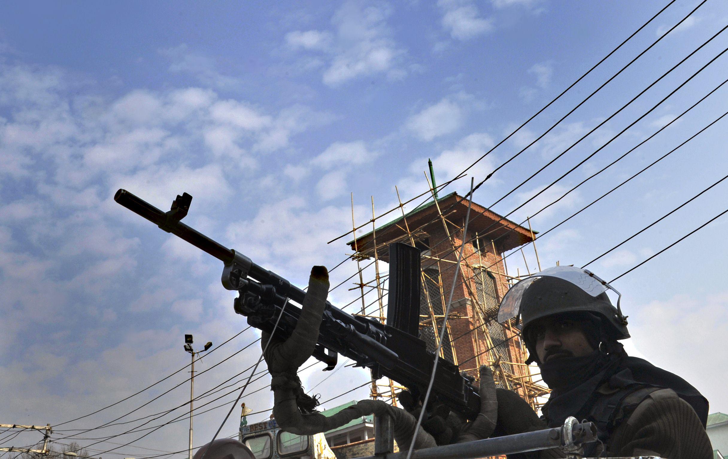 indian central reserve police force crpf officers patrol at srinagar s central square lal chowk in srinagar photo afp