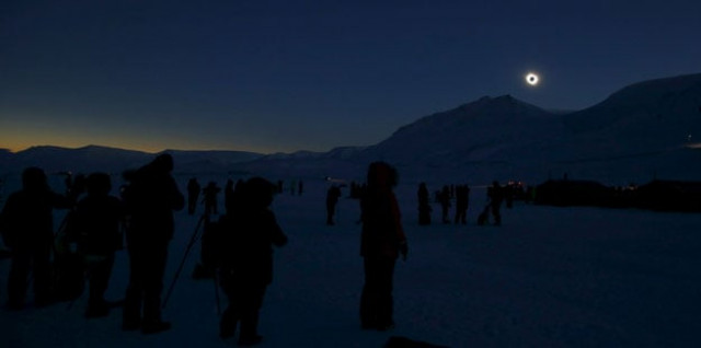 people look at a total solar eclipse on svalbard march 20 2015 photo reuters