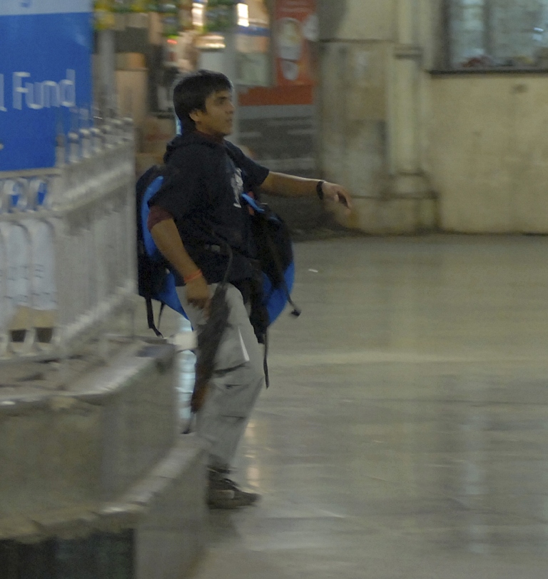 mohammad ajmal kasab a suspected gunman walks in the premises of the chhatrapati shivaji terminus or victoria terminus railway station in mumbai in this november 26 2008 file photo photo reuters file