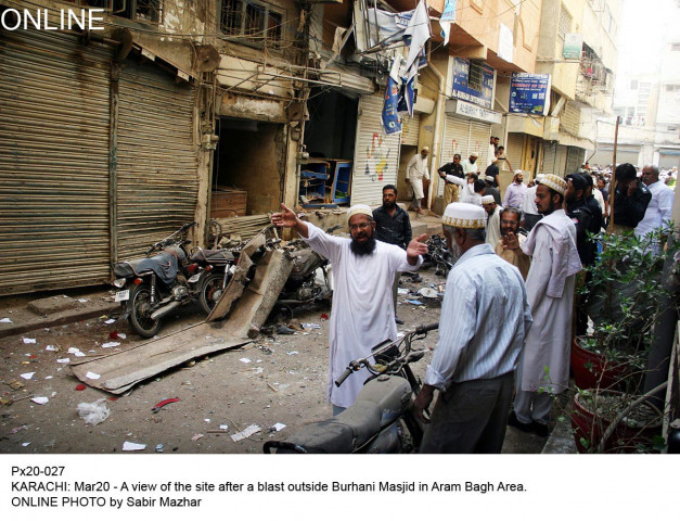 members of the bohra community cry out after a bomb went off outside their mosque in karachi on friday photo online