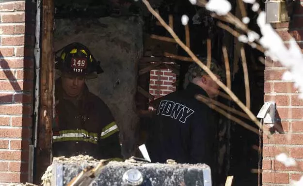 firefighters inspect a home fire in the midwood neighborhood in brooklyn on march 21 2015 in new york city seven children from the same family died in the fire ranging in age from 5 to 15 years old with two others in critical condition photo afp firefighters inspect a home fire in the midwood neighborhood in brooklyn on march 21 2015 in new york city seven children from the same family died in the fire ranging in age from 5 to 15 years old with two others in critical condition photo afp
