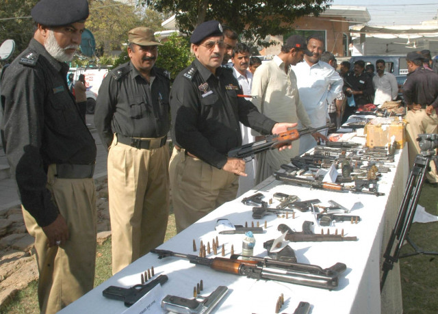 karachi police displays weapons captured from militants in the city on sunday march 22 2015 photo irfan ali express karachi police displays weapons captured from militants in the city on sunday march 22 2015 photo irfan ali express