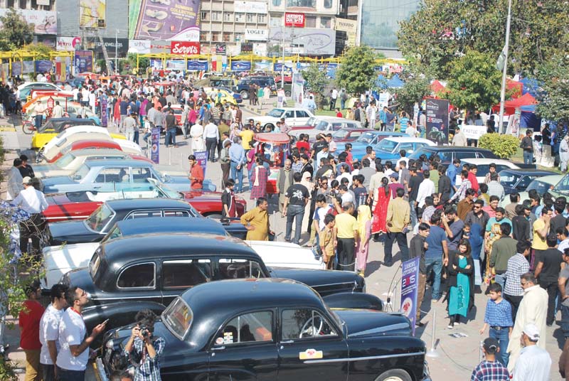 a large crowd turned out to see cars displayed at the liberty roundabout photo abid nawaz express