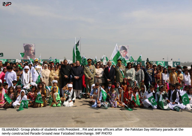 group photo of students with president pm and army officers after the pakistan day parade photo inp