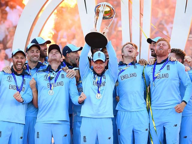 england 039 s eoin morgan celebrates with his team as he lifts the 2019 cricket world cup trophy photo getty