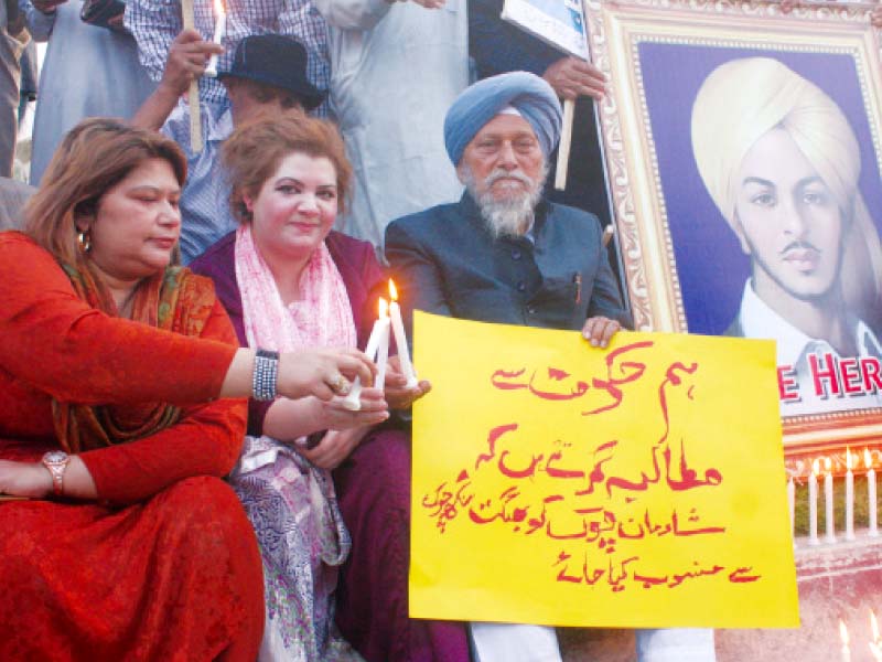 the bhagat singh foundation and the bhagat singh memorial foundation had organised the candlelight vigil at fawara chowk near shadman photo abid nawaz express