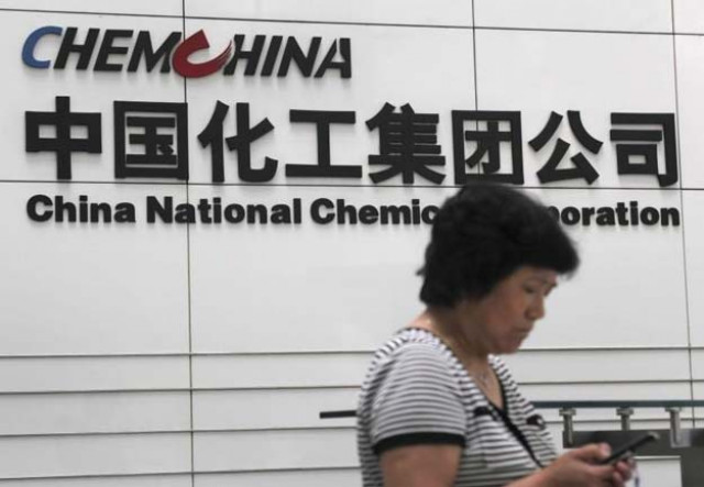 a woman checks her phone at the headquarters of china national chemical corporation in beijing july 20 2009 photo reuters a woman checks her phone at the headquarters of china national chemical corporation in beijing july 20 2009 photo reuters