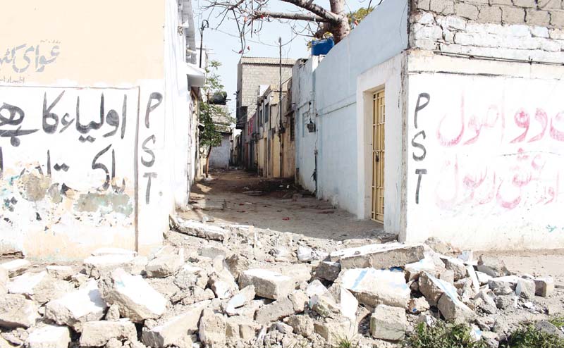 the rangers tore down walls blocking the way on jahangir road as they began their crackdown against blockades across the city on wednesday the three day deadline given by the law enforcers expired on tuesday photo ppi