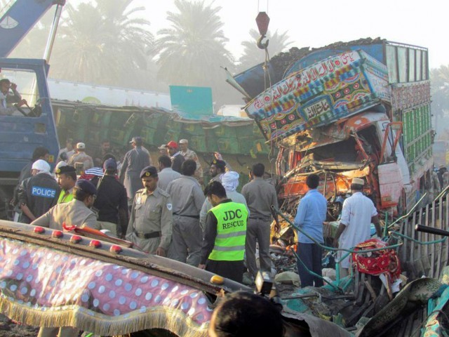 head on collision between passenger coach and truck also leaves 20 injured photo afp