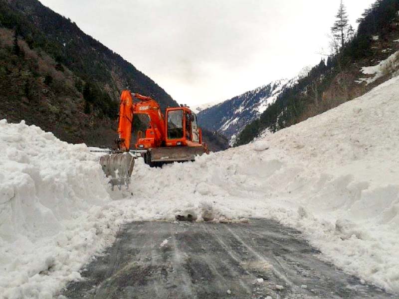 snow being cleared on naran road photo express