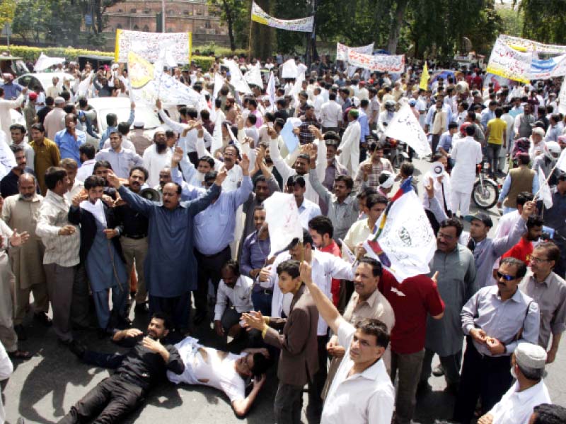 all pakistan clerks association apca members protest against the government on thursday photo abid nawaz express