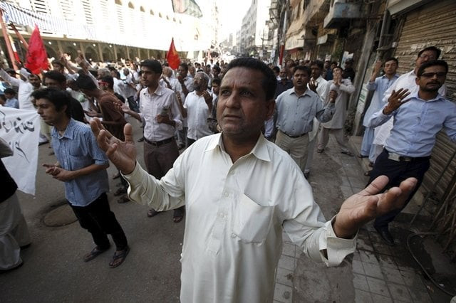 a pakistani man prays with others during a protest against saudi arabia over its intervention in yemen in karachi photo reuters a pakistani man prays with others during a protest against saudi arabia over its intervention in yemen in karachi photo reuters