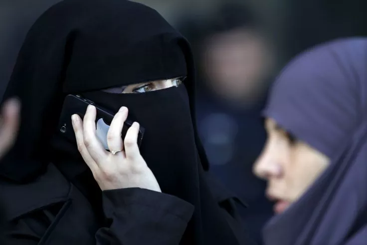 a women wearing a niqab despite a nationwide ban on the islamic face veil in france in 2011 photo reuters a women wearing a niqab despite a nationwide ban on the islamic face veil in france in 2011 photo reuters