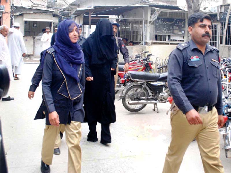 police escorting ayyan at the district courts on saturday photo nni