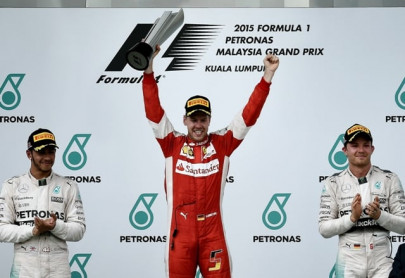 vettel ends ferrari win drought with malaysian gp success