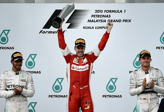 shock win sebastian vettel stunned world champion lewis hamilton and mercedes on sunday with an audacious malaysian grand prix victory which ignited the formula one season photo afp shock win sebastian vettel stunned world champion lewis hamilton and mercedes on sunday with an audacious malaysian grand prix victory which ignited the formula one season photo afp
