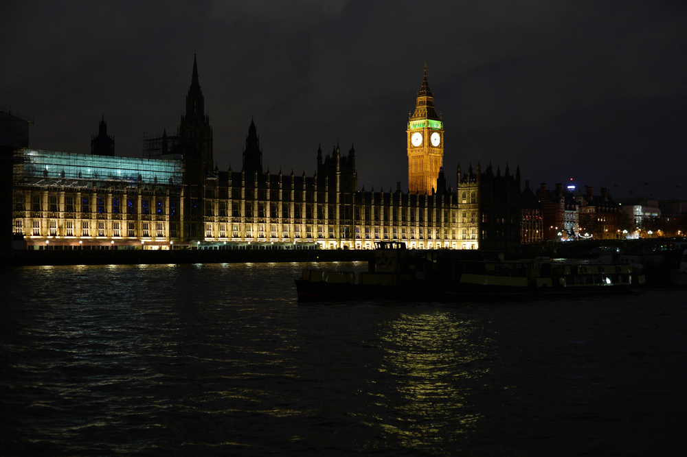 a picture taken on march 28 2015 in central london shows the houses of parliament before being submerged into darkness for the earth hour environmental campaign millions are expected to take part around the world in the annual event organised by conservation group wwf with hundreds of well known sights set to plunge into darkness photo afp