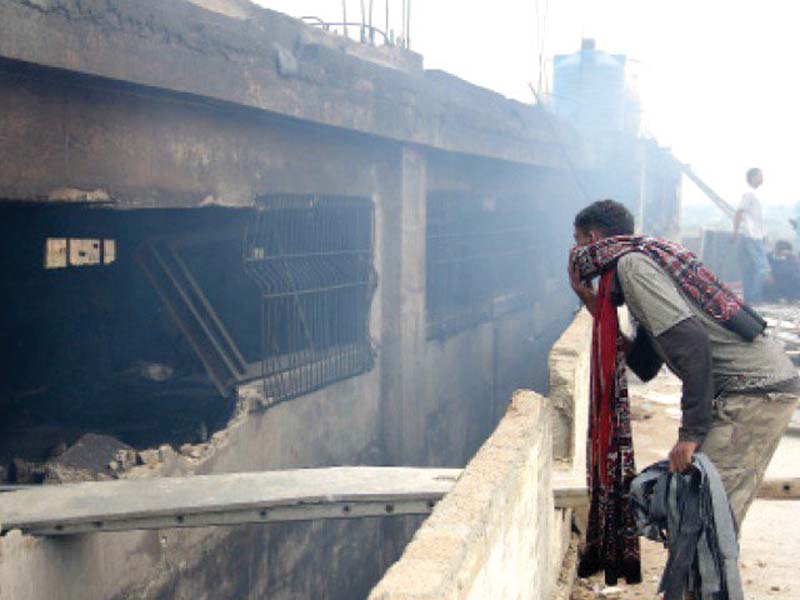 the baldia factory fire claimed over 250 lives on september 11 2012 photo file