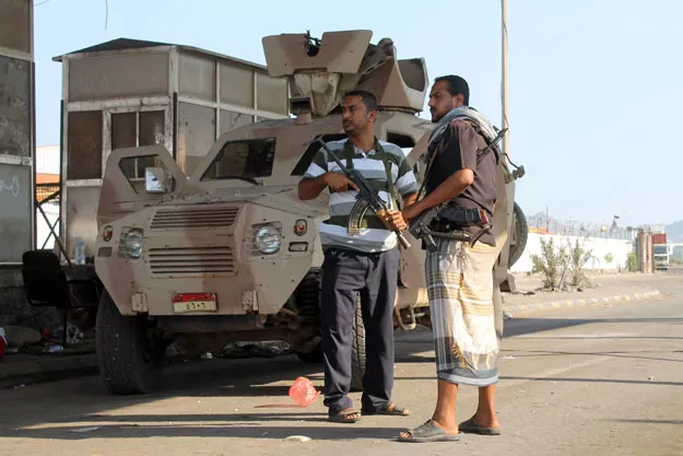 yemeni supporters of the separatist southern movement stand guard at the entrance of the port in the southern city of aden on march 29 2015 photo afp yemeni supporters of the separatist southern movement stand guard at the entrance of the port in the southern city of aden on march 29 2015 photo afp