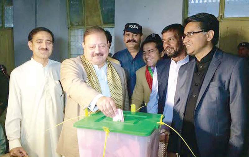 barrister sultan mahmood casts his vote during the ajk by polls photo nni