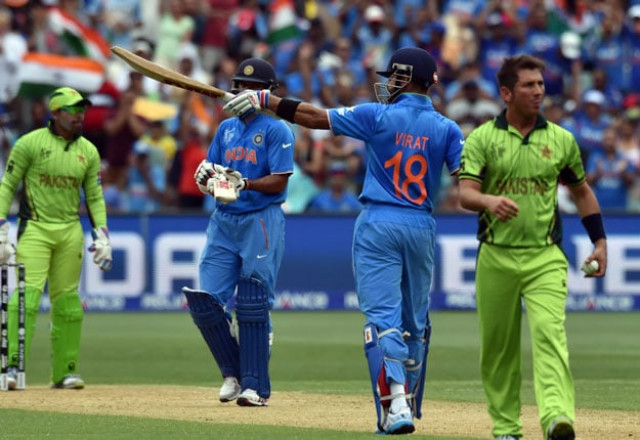 india 039 s batsman virat kohli c celebrates his 50 runs against pakistan during the pool b 2015 cricket world cup match between indian and pakistan at the adelaide oval on february 15 2015 photo afp