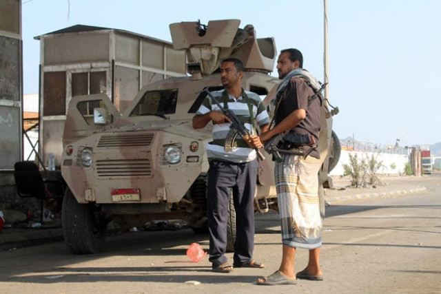 yemeni supporters of the separatist southern movement stand guard at the entrance of the port in the southern city of aden on march 29 2015 photo afp yemeni supporters of the separatist southern movement stand guard at the entrance of the port in the southern city of aden on march 29 2015 photo afp