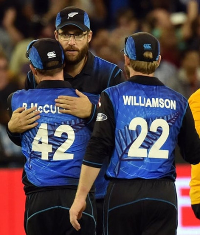 in this file photo new zealand player daniel vettori c gives a hug to team captain brendon mccullum l as kane williamson r looka on after their defeat against australia in the 2015 cricket world cup final in melbourne on march 29 2015 photo afp in this file photo new zealand player daniel vettori c gives a hug to team captain brendon mccullum l as kane williamson r looka on after their defeat against australia in the 2015 cricket world cup final in melbourne on march 29 2015 photo afp