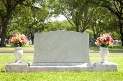mother in law s tombstone topples on man killing him