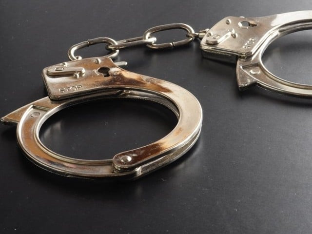 suspect bilal qureshi alias chingari was arrested after an encounter with the police in new karachi on monday stock image suspect bilal qureshi alias chingari was arrested after an encounter with the police in new karachi on monday stock image