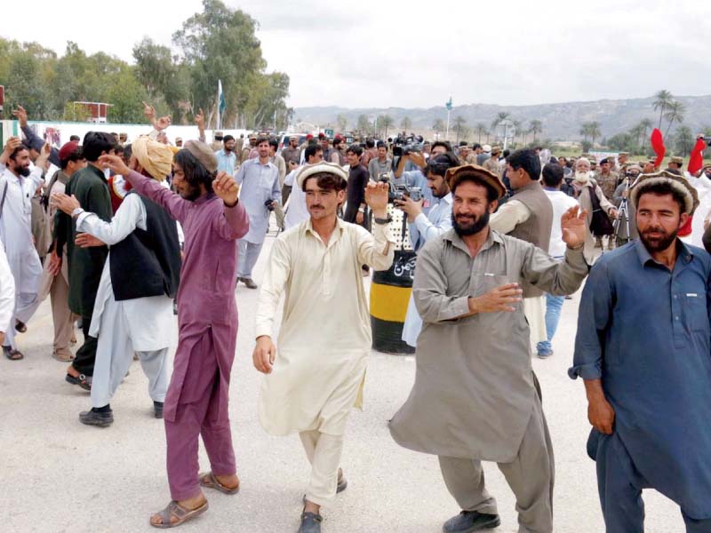 idps dance on their way back to their homes in north waziristan photo inp