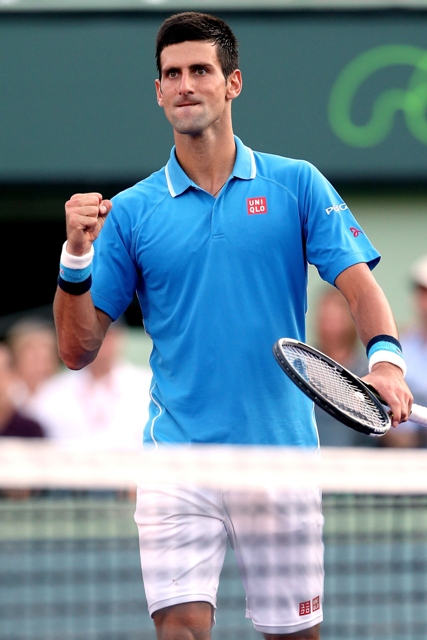 novak djokovic celebrates winning the second set against alexandr dolgopolov of ukraine during day 9 of the miami open presented by itau at crandon park tennis center photo afp