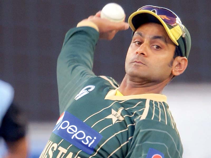 muhammad hafeez was reported for suspect bowling action in november against new zealand and now faces a retest which will determine whether the 31 year old is now bowling within the permissible parametres photo afp