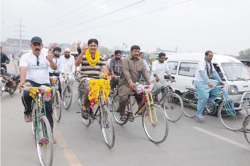 jamshed ahmad leads the convoy of bicycle riders photo shafiq malik express