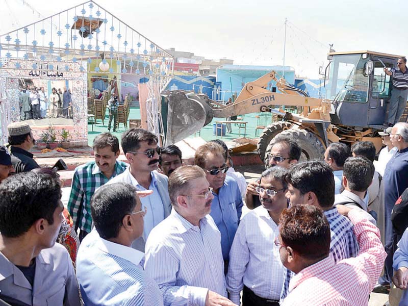 sharjeel memon supervises demolition of an illegal marriage hall in korangi photo app