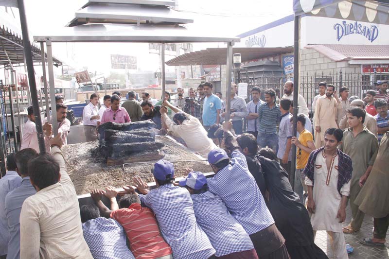 dilpasand sweets in north nazimabad block a was sealed and the kiosk outside the eatery was demolished by the authorities as part of the ongoing drive against encroachment photo mohammad noman express