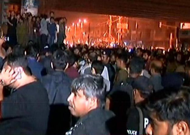 a screengrab of the police dispersing the crowd a screengrab of the police dispersing the crowd