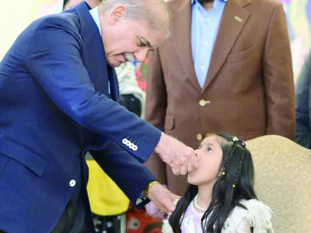 prime minister shehbaz sharif administers polio vaccine to a child during the inaugural ceremony of national polio eradication campaign in the federal capital photo express prime minister shehbaz sharif administers polio vaccine to a child during the inaugural ceremony of national polio eradication campaign in the federal capital photo express