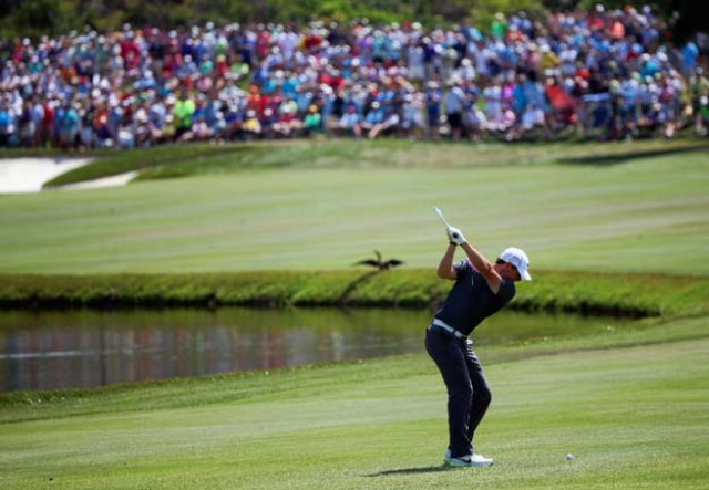 rory mcilroy of northern ireland hits an approach shot on the sixth hole during the third round of the arnold palmer invitational on march 21 2015 in orlando florida photo afp rory mcilroy of northern ireland hits an approach shot on the sixth hole during the third round of the arnold palmer invitational on march 21 2015 in orlando florida photo afp