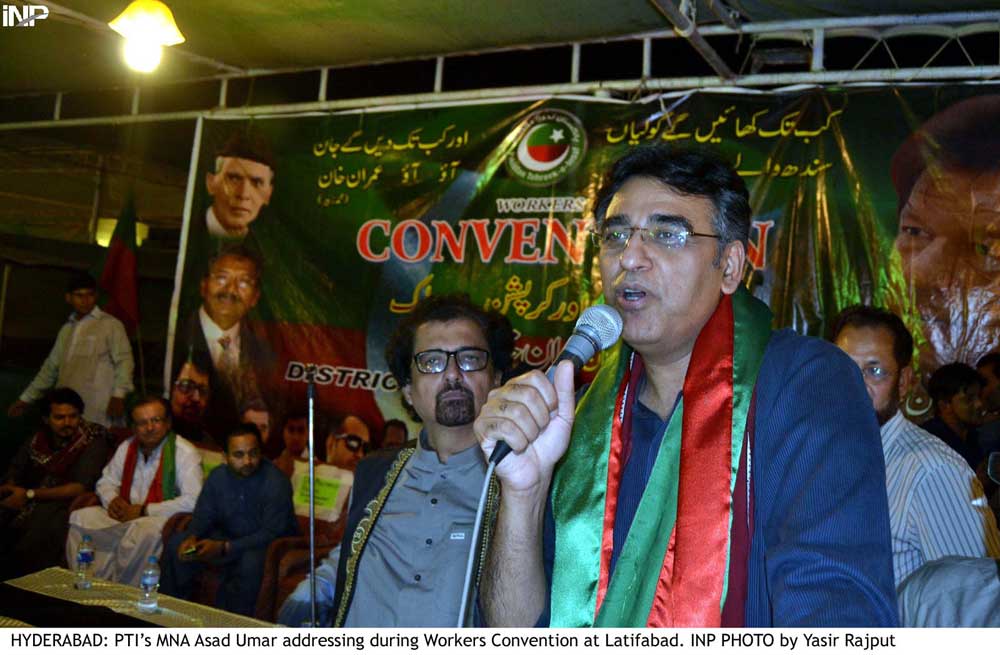 asad umar addressing the workers convention at latifabad photo inp