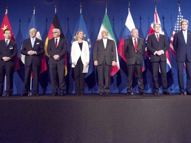 foreign ministers and secretaries pose fro a group photo after iran nuclear programme talks in lausanne switzerland photo afp