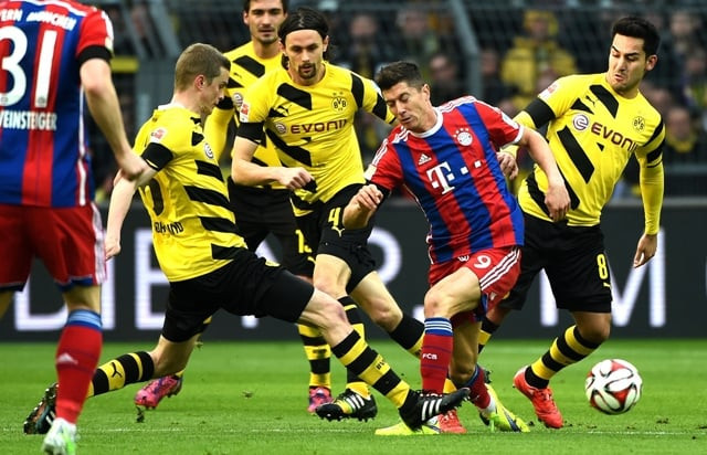 poland striker robert lewandowski returned to haunt his former club and his first half header at dortmund 039 s westfalenstadion gave bayern their 21st league win of the season to stay on course for a third league title photo afp poland striker robert lewandowski returned to haunt his former club and his first half header at dortmund 039 s westfalenstadion gave bayern their 21st league win of the season to stay on course for a third league title photo afp